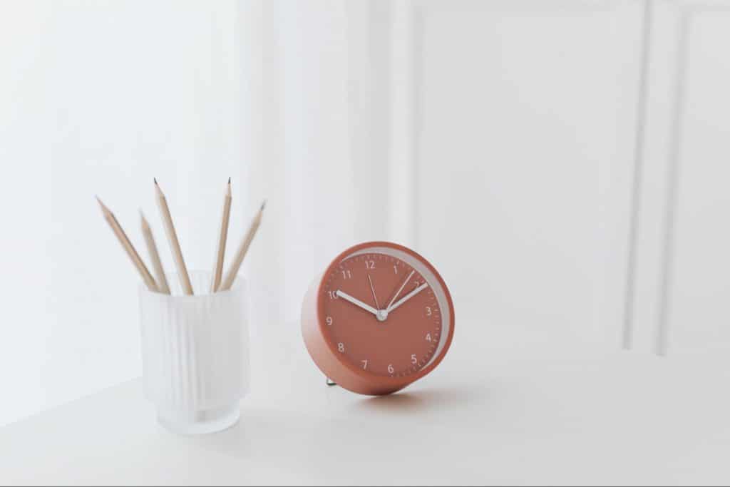 clock on white desk