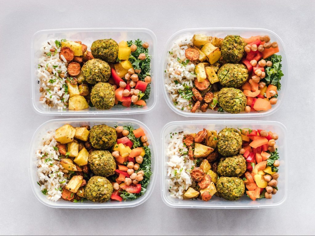 Healthy prebiotic filled meal prep lunches viewed from above.