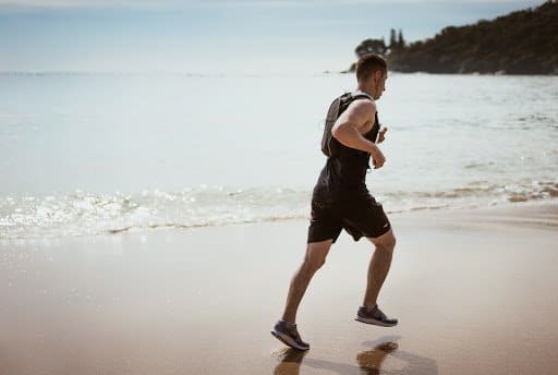 man-running-on-beach