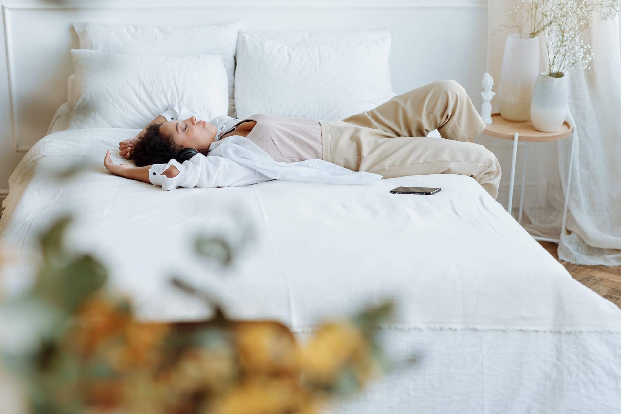 Woman lying on bed resting