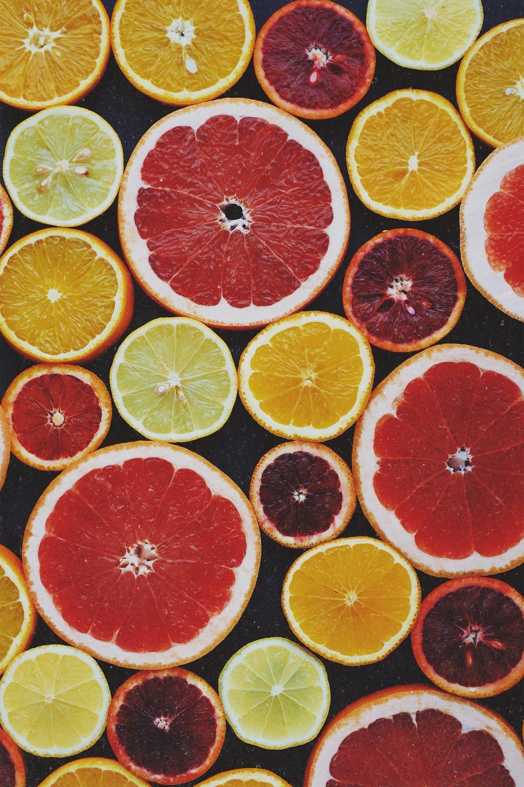 top-view-photo-of-sliced-citrus-fruits