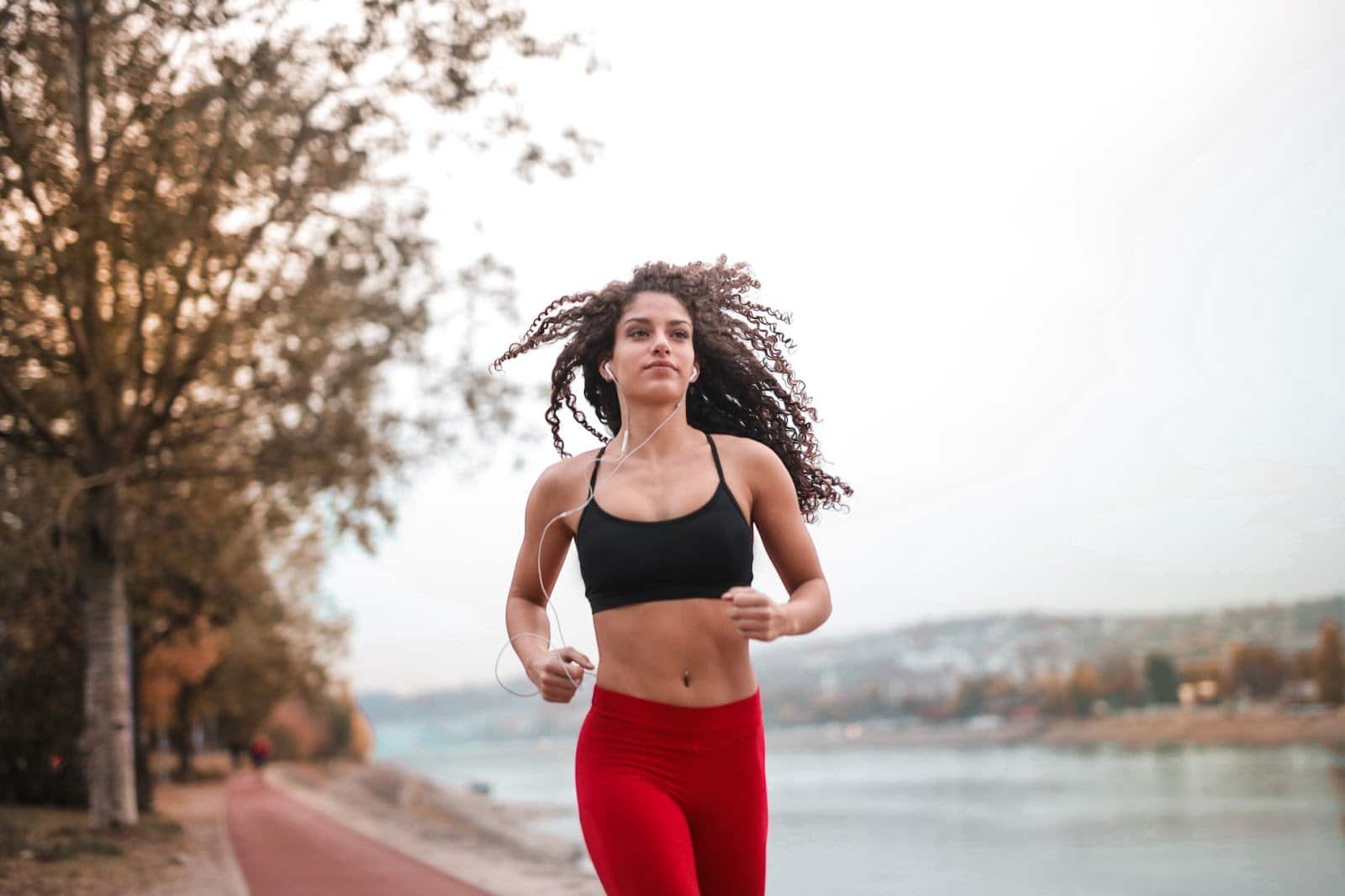 woman-in-black-sports-bra-running